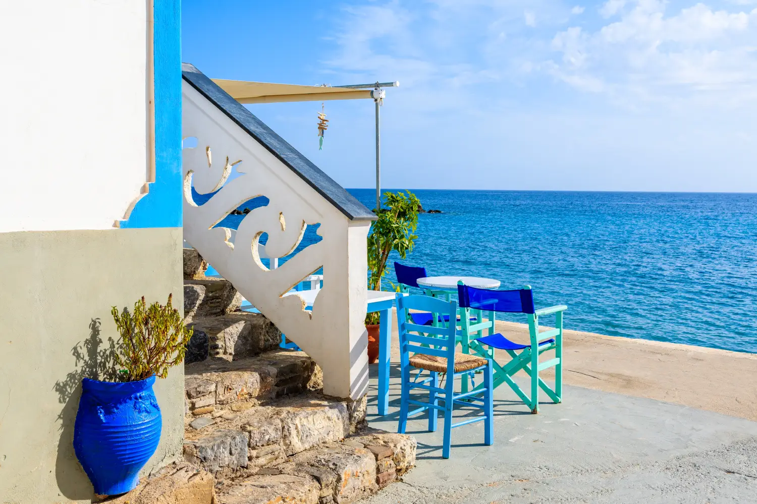 Ferry to Diafani - Traditional Greek tavern in Diafani port on Karpathos island, Greece.