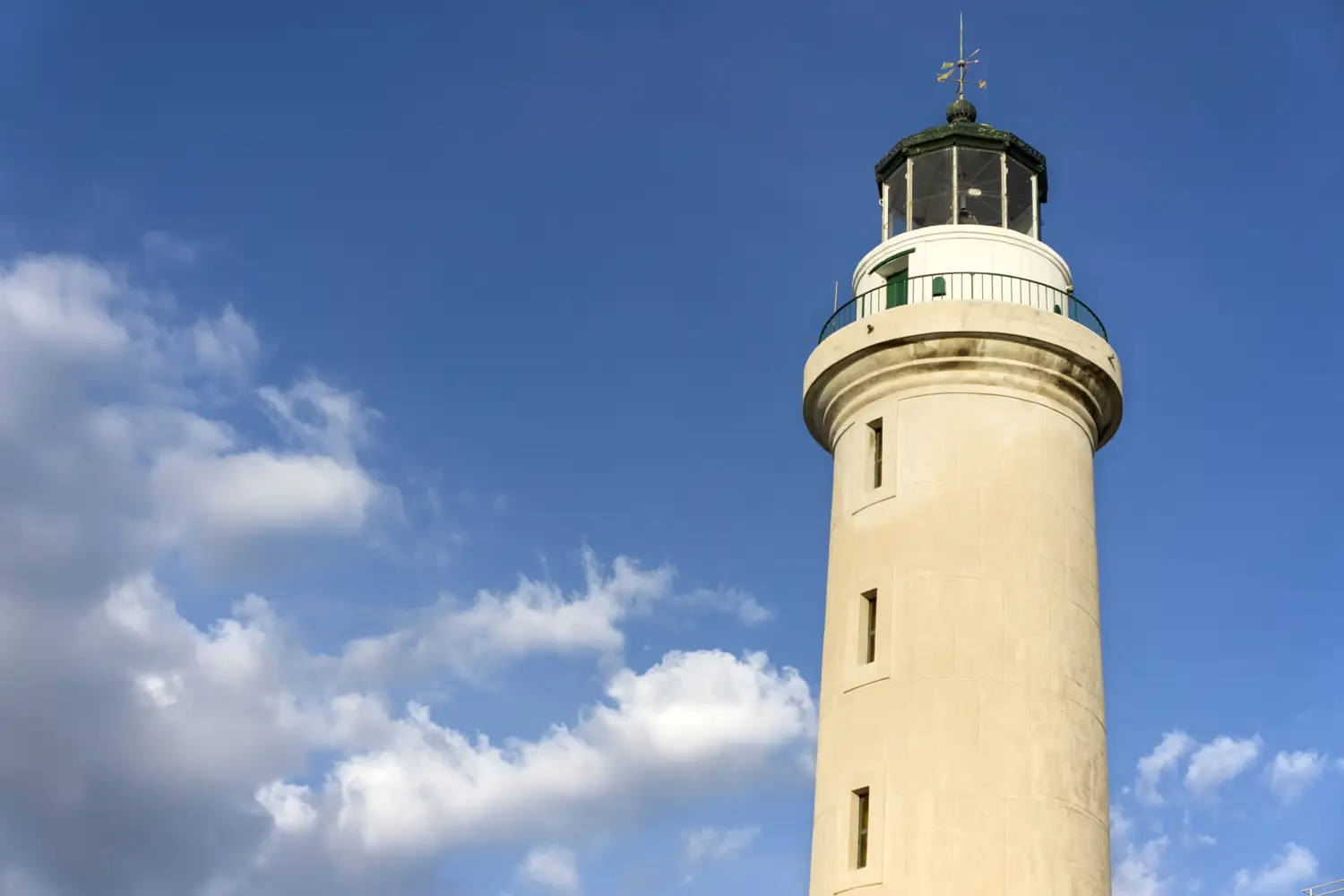 Ferry to Alexandroupolis - Alexandroupolis lighthouse with sky background under sunlight.