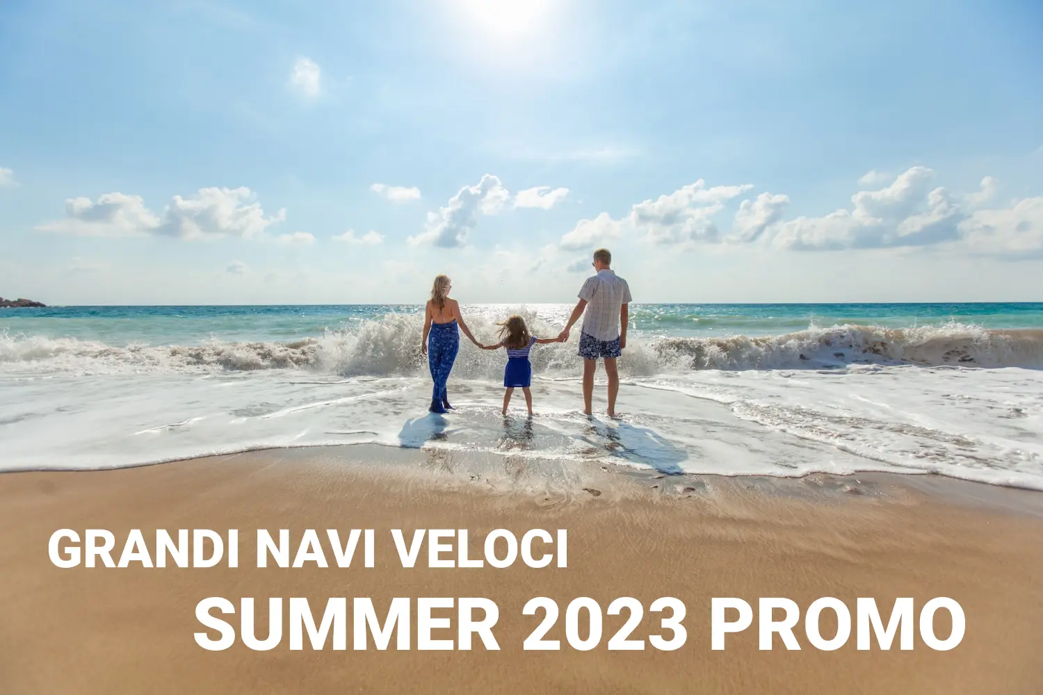 GNV Summer 2023 Promo - A family of three is holding hands on the beach.