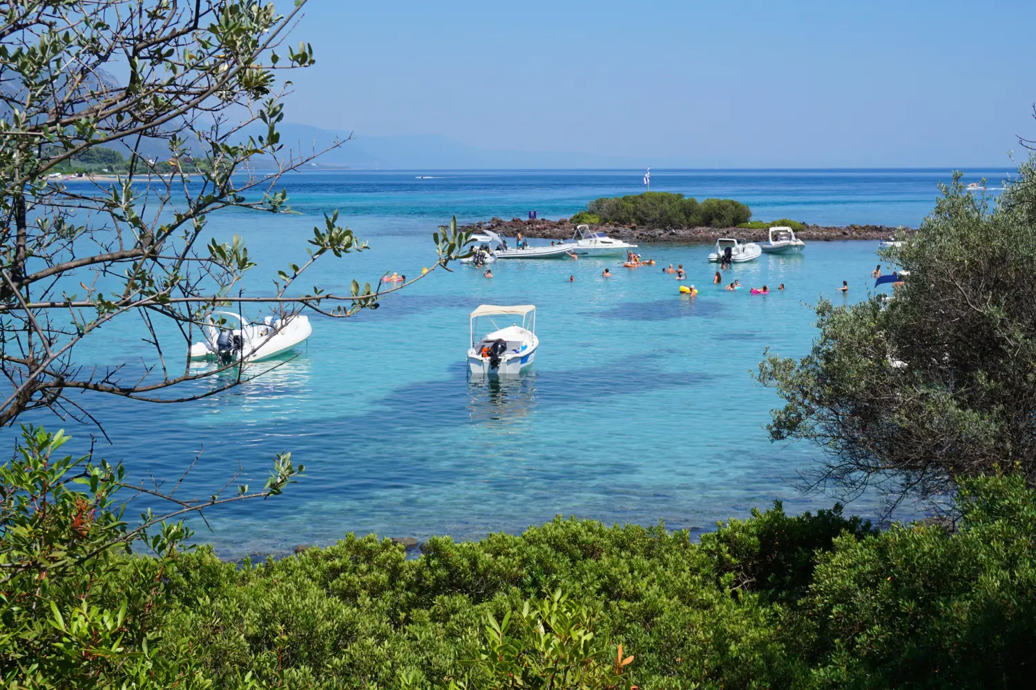 Ferry to Evia - Photo from famous volcanic islands of Lihadonisia with clear water beaches, North Evoia island, Greece.