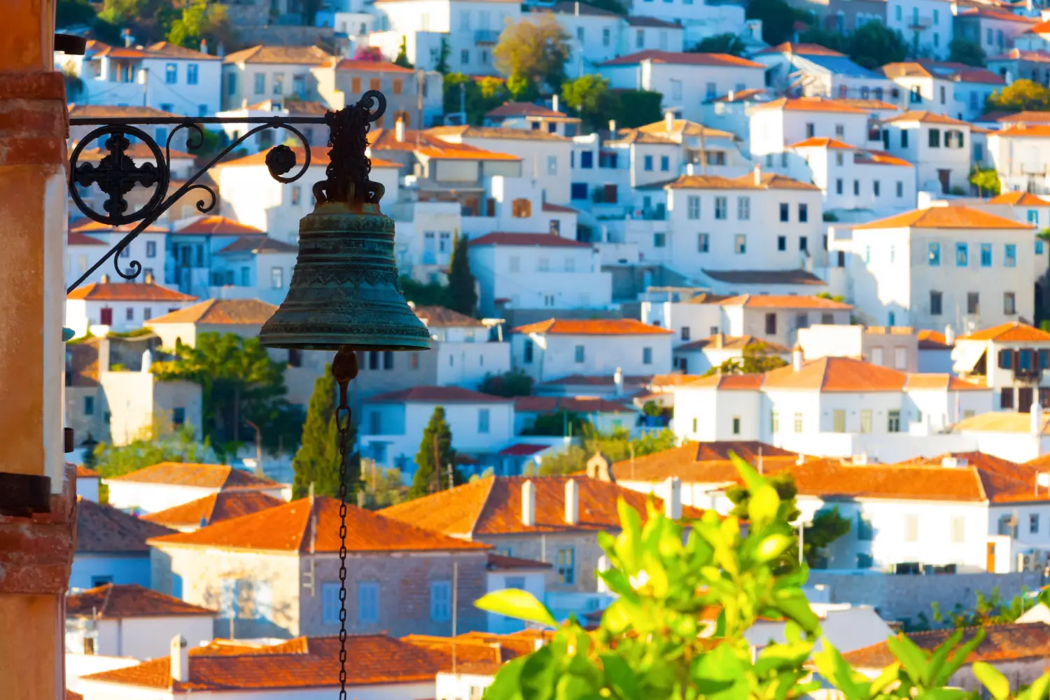 Ferry to Hydra - Old aged bell in church at Hydra island in Greece at saronikos gulf.