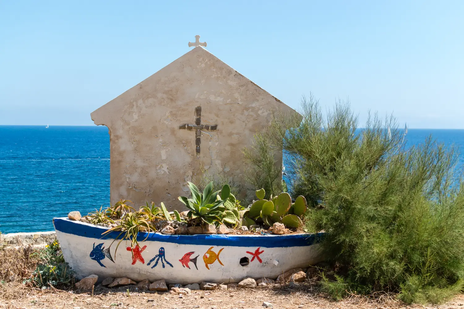 Ferry to Marettimo - Marettimo, Sicily. Little church at seaside.
