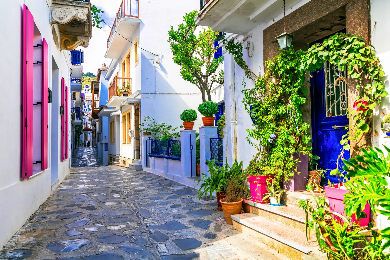 Ferry to Sporades Islands - Charming traditional narrow streets of greek islands. Skopelos town. Northe Sporades of Greece.