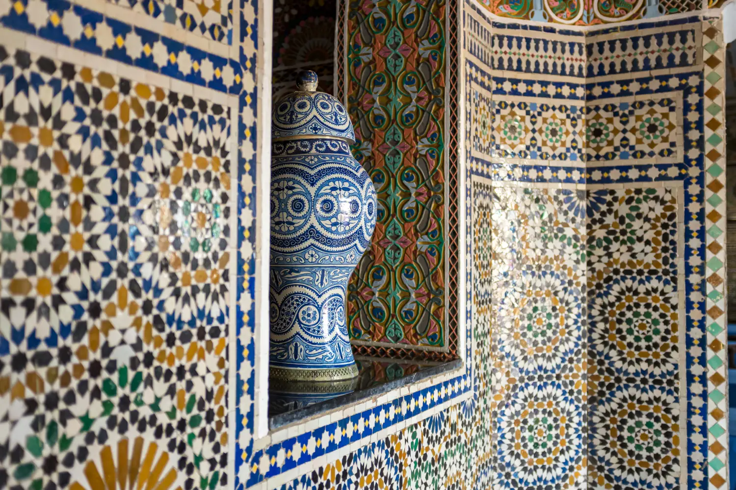 Ferry to Tangier - Zellij tiles alongside an ornate vase in Tangier, Morocco.