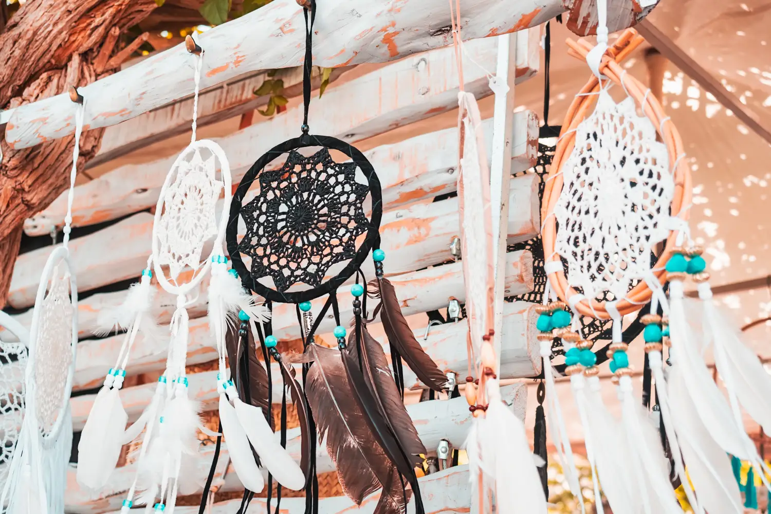 Ferry to Ibiza - Accessories and handmade dream catcher souvenirs at the hippie de las Dalias market on the island of Ibiza, in summer.