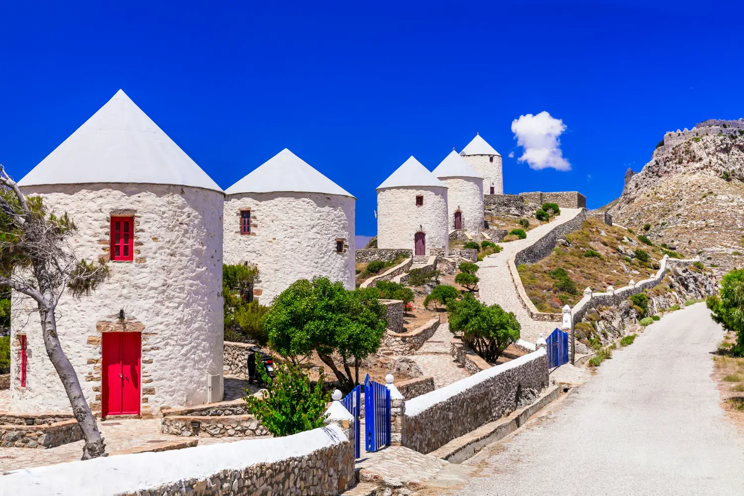 Ferry to Leros - Traditional Greece windmills of Leros island, Dodecanese.