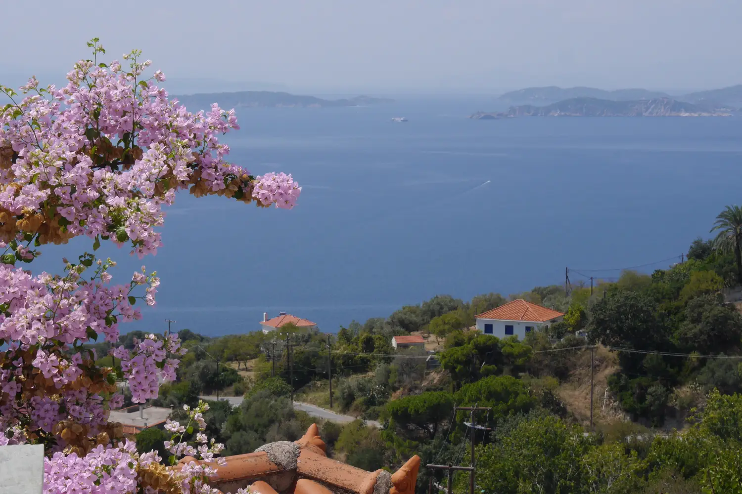 Ferry to Glossa (Skopelos) - Views of the sea and the city of Glossa on the island of Skopelos, Greece.
