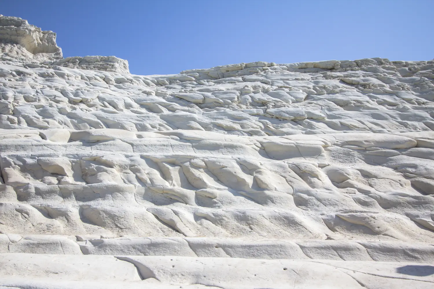 Ferry to Porto Empedocle - The rocky white cliffs Stair of the Turks, Sicily, Italy.