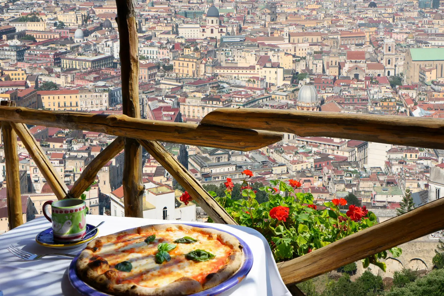 Ferry to Naples - Pizza place terrace with Naples view, Italy.