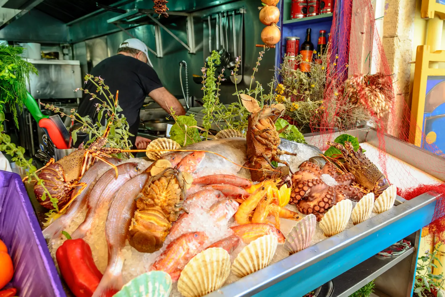 Ferry to Rethymno - Fresh seafood served at Greek restaurant in Rethymno city on Crete island. Europe.