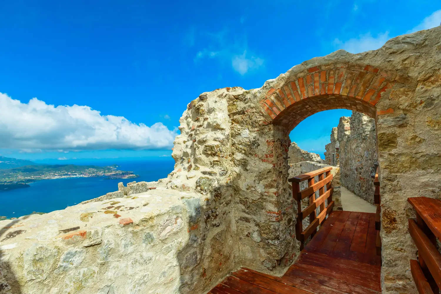 Ferry to Portoferraio - Top arcade balcony of the Volterraio Castle, the oldest fortress on Elba Island, Tuscany, Italy. Never conquered in all history.