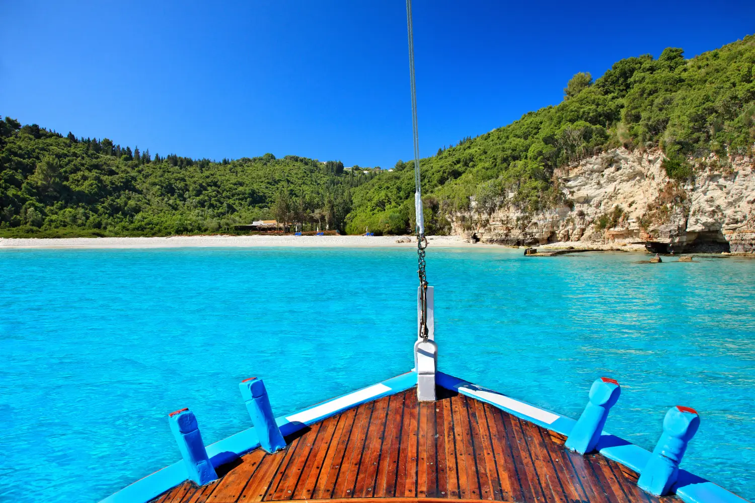 Ferry to Paxi - Approaching the exotic Voutoumi beach, Antipaxos island, Kerkyra or Corfu, Ionian Sea, Greece.