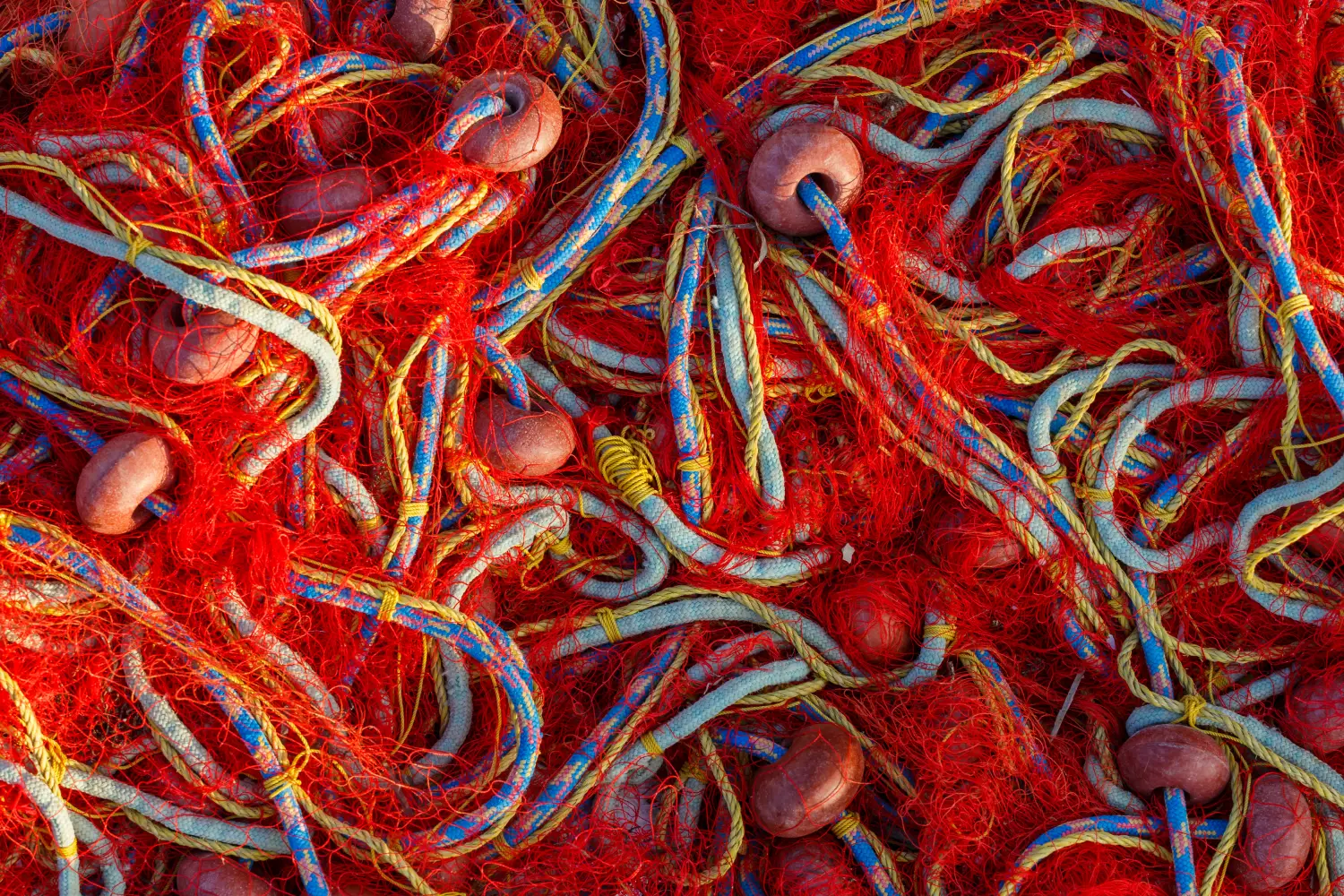 Ferry to Agistri - Detail of a fishing net, Skala village on Agistri island, Greece.