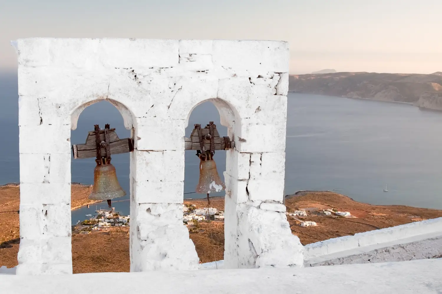 Ferry to Kythira - The little bell-tower of a church overlooking the village of Avlemonas in Kithira island, Greece.