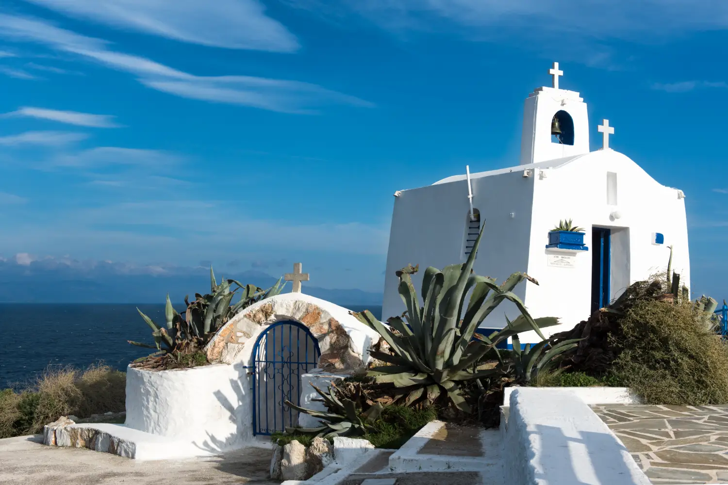 Ferry to Rafina - Typical greek place with a white small orthodox chapel dedicated to St Nikolaos. Rafina, Greece.