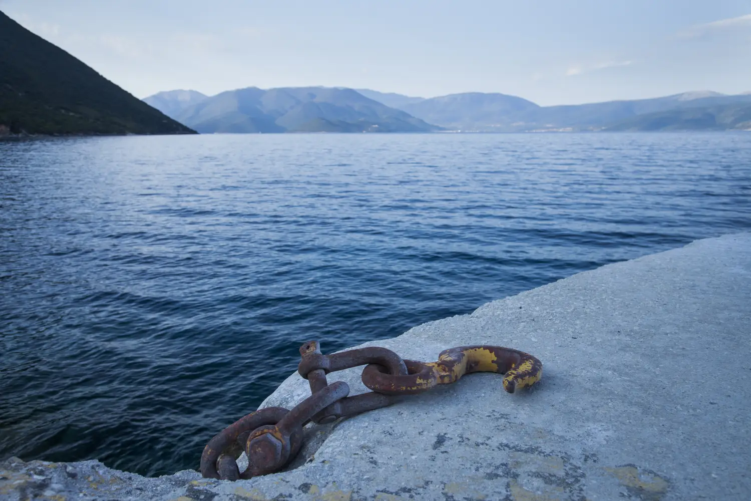 Ferry to Pisaetos (Ithaca) - Metal hook on the landing stage at Pisaetos port, Ithaca, Greece.