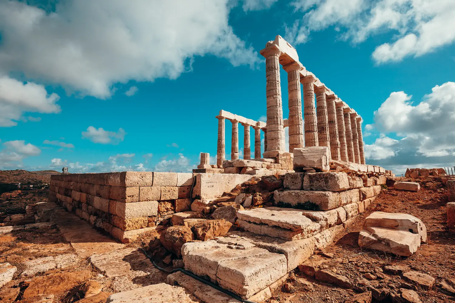 Ferry to Lavrio - The Ancient Greek temple of Poseidon at Cape Sounion, Athens, Greece.
